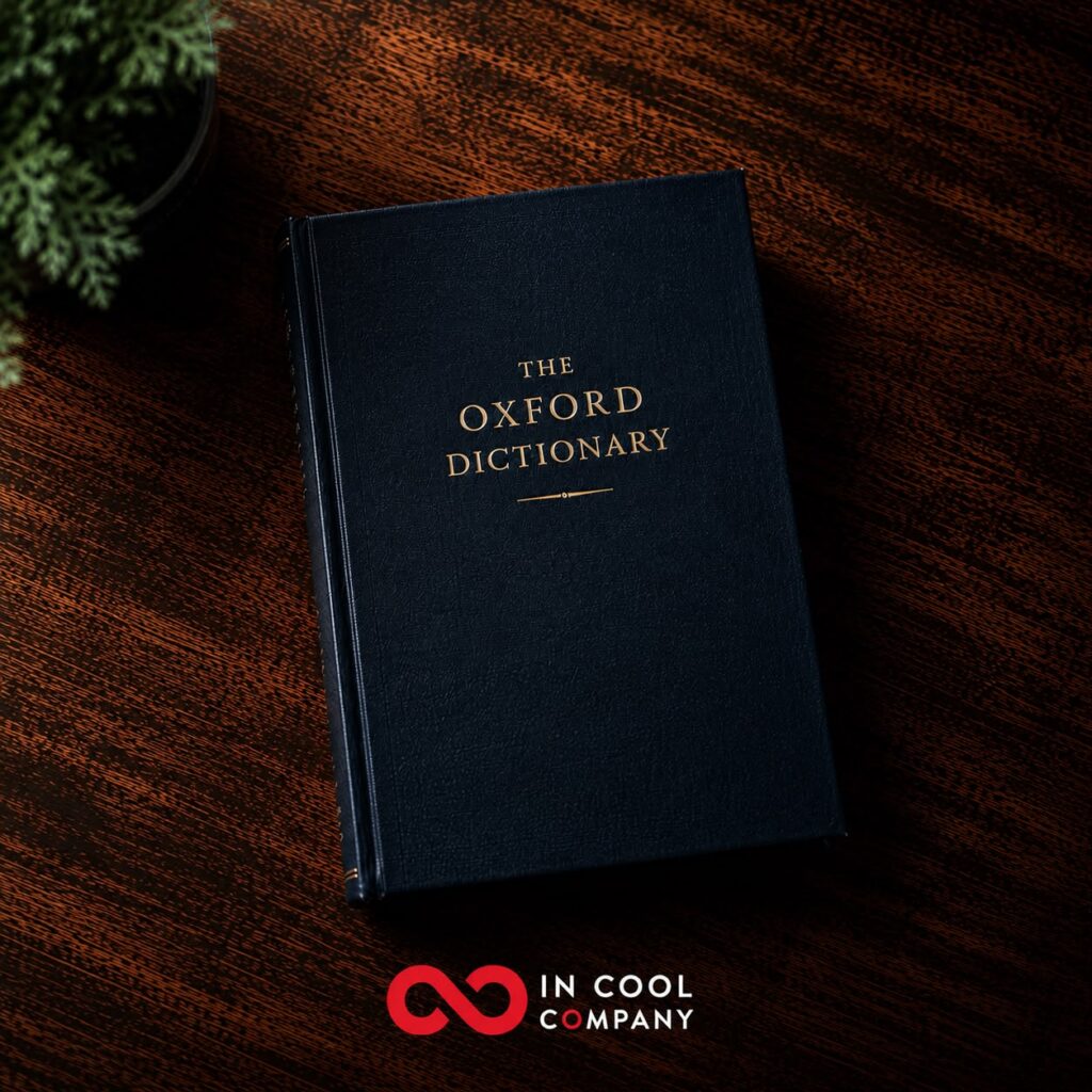 The Oxford Dictionary sits closed on a table